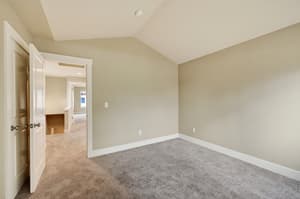 Bedroom with neutral walls, carpeted floor at Glisan Townhomes, 17218-17298 NE Glisan St, Gresham, Oregon 97230