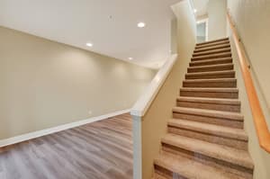Hallway with carpeted stairs, recessed lighting at Glisan Townhomes, 17218-17298 NE Glisan St, Gresham, Oregon 97230