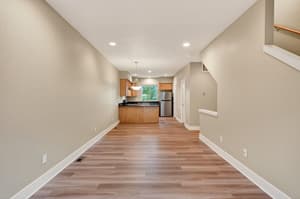 Kitchen with stainless steel appliances, hardwood floors at Glisan Townhomes, 17218-17298 NE Glisan St, Gresham, Oregon 97230
