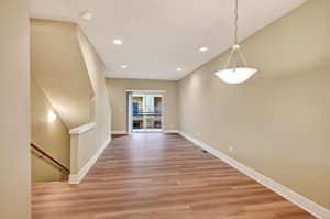 Living room with hardwood floors at Glisan Townhomes