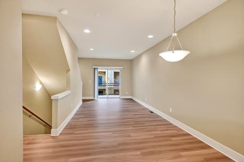 Living room with hardwood floors at Glisan Townhomes