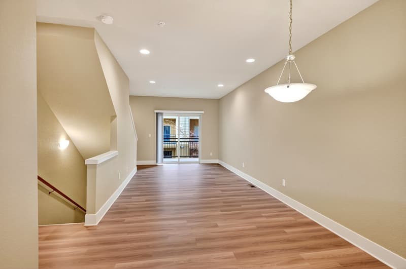 Living room with hardwood floors at Glisan Townhomes