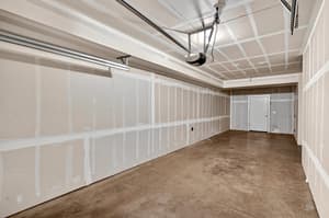 Storage with concrete floor, unfinished walls at Glisan Townhomes, 17218-17298 NE Glisan St, Gresham, Oregon 97230