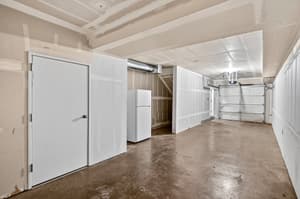 Storage area with garage door at Glisan Townhomes