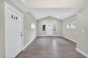 Hallway with wood floors, recessed lighting at Glisan Townhomes, 17218-17298 NE Glisan St, Gresham, Oregon 97230