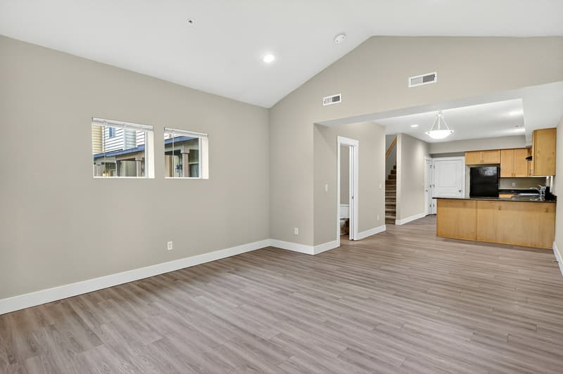 Living room with vaulted ceiling at Glisan Townhomes