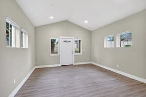 Living Room with vaulted ceiling, recessed lighting at Glisan Townhomes, 17218-17298 NE Glisan St, Gresham, Oregon 97230
